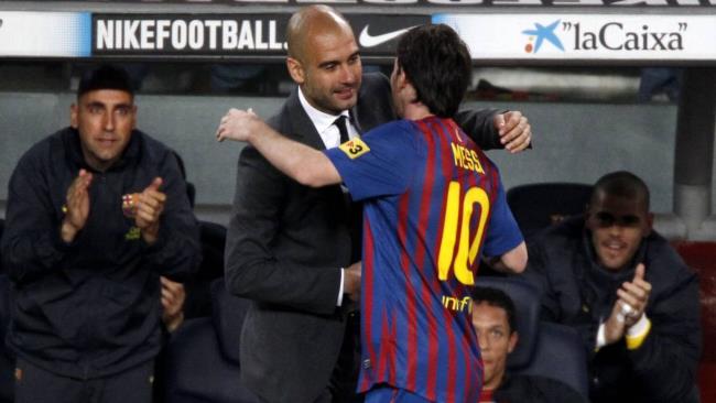 Guardiola y Messi