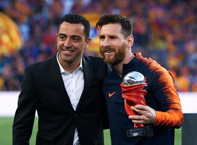 Xavi Hernández y Messi