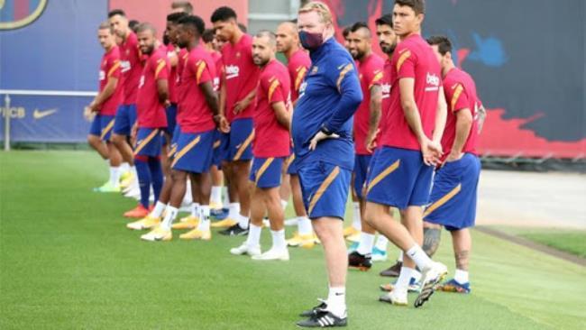 Koeman y su plantilla