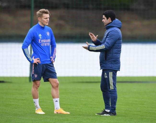 Odegaard y Arteta