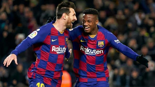 Ansu Fati y Leo Messi
