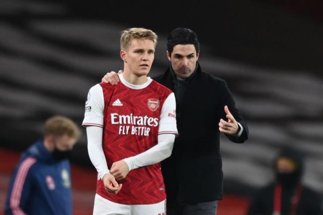 Odegaard y Arteta