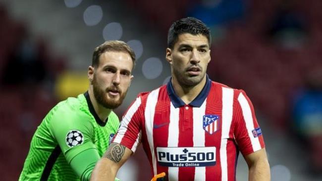 Oblak y Luis Suárez