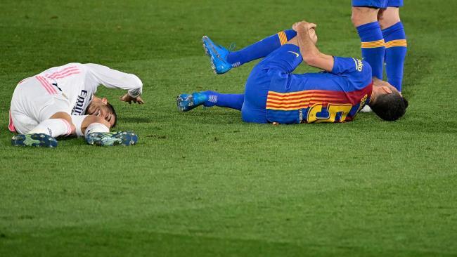 Lucas Vázquez y Sergio Busquets