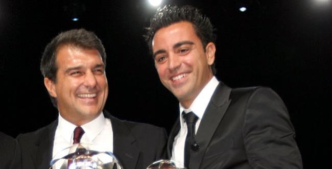 Xavi y Laporta durante la primera etapa del presidente en el club