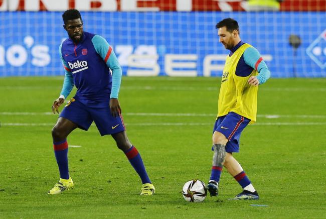 Samuel Umtiti y Leo Messi