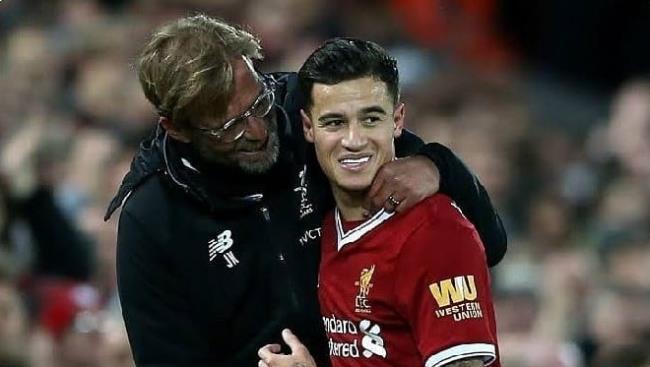 Klopp y Coutinho
