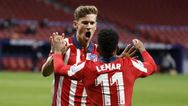 Marcos Llorente y Thomas Lemar