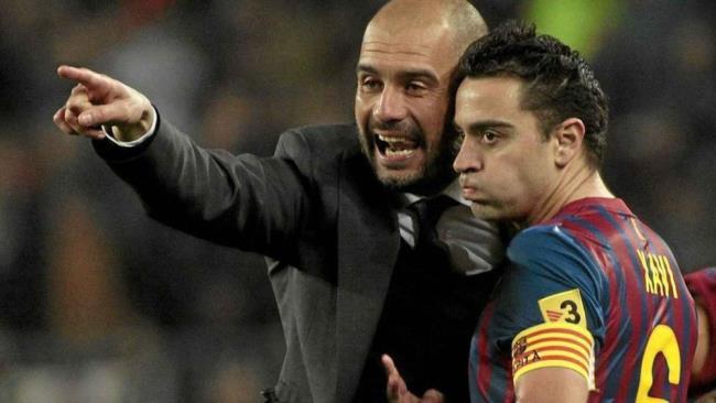 Guardiola y xavi