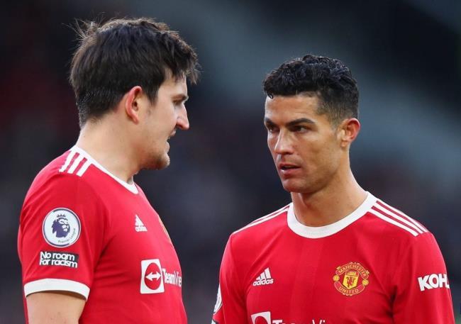 Maguire y Cristiano Ronaldo