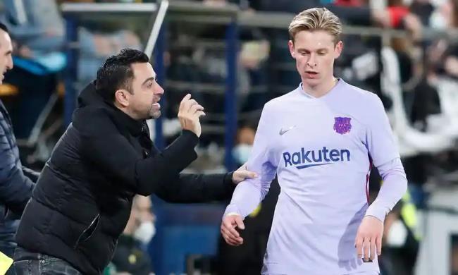 Xavi y De Jong