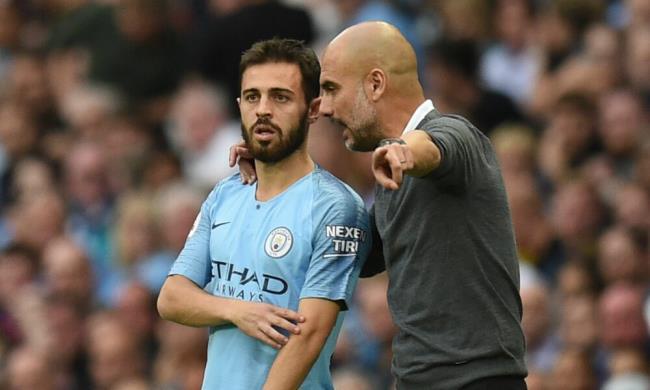 Pep Guardiola y Bernardo Silva
