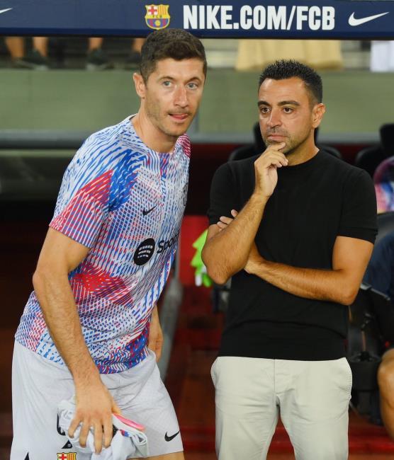 Lewandowski y Xavi