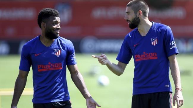 Thomas Lemar y Yannick Ferreira Carrasco, futbolistas del Atlético de Madrid
