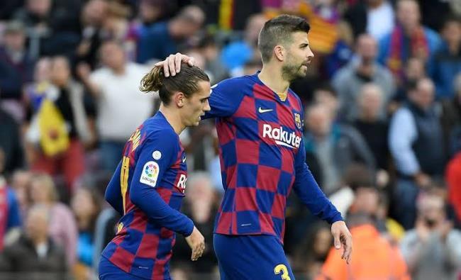 Pique y Griezmann
