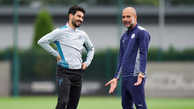 Gundogan y Guardiola