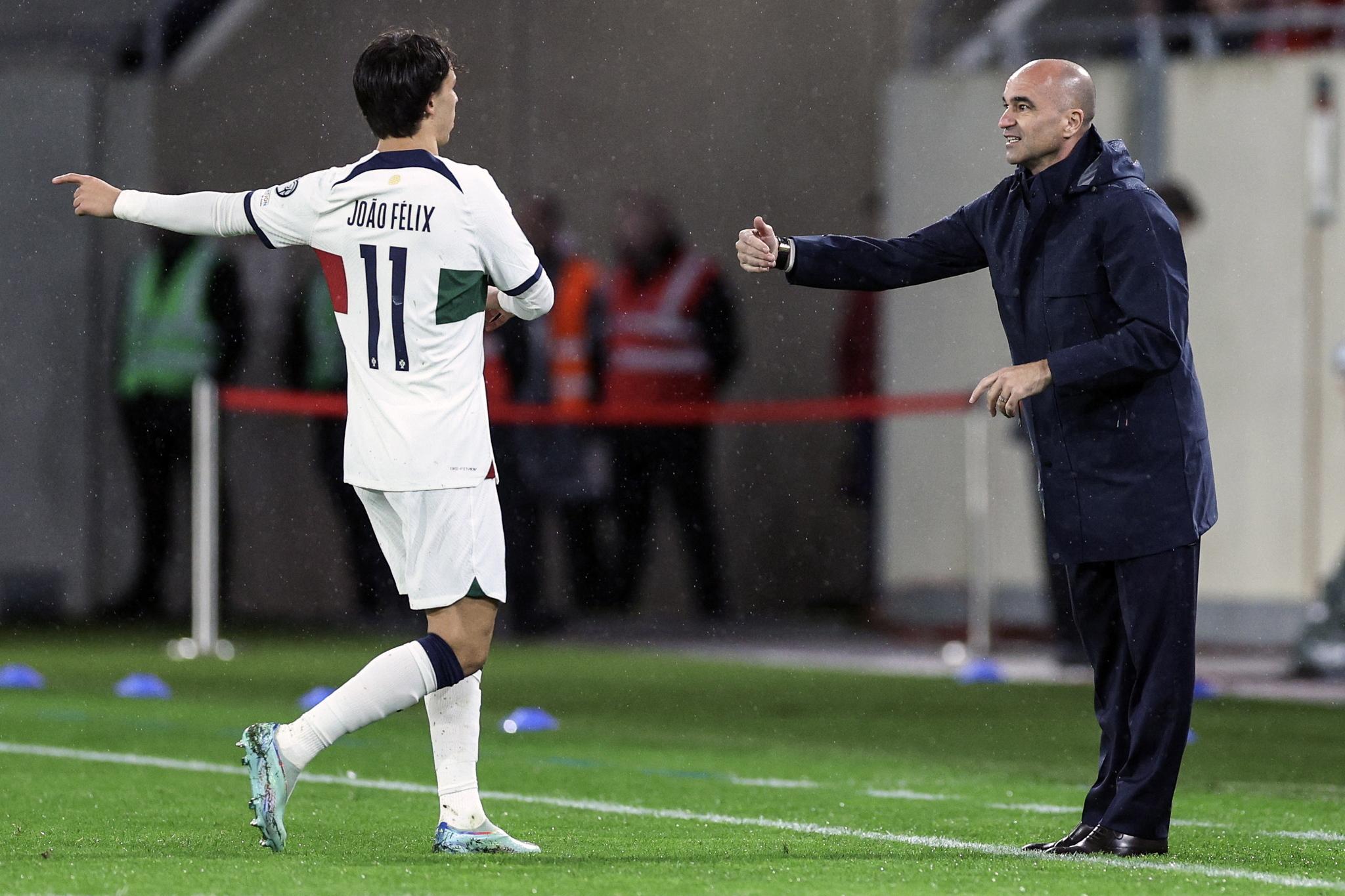 Joao Félix y Roberto Martínez