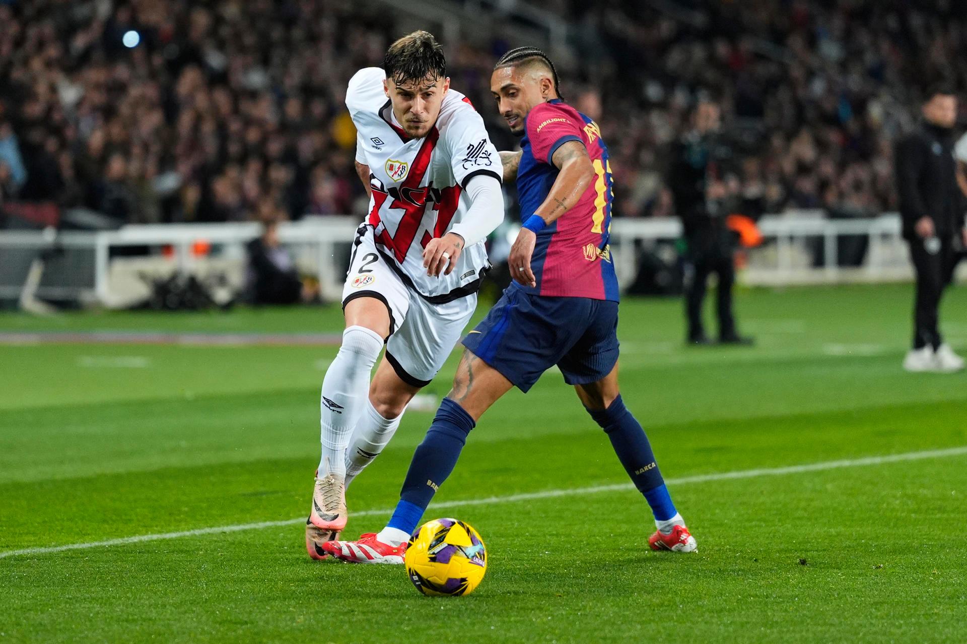 Andrei Ratiu y Raphinha - EFE