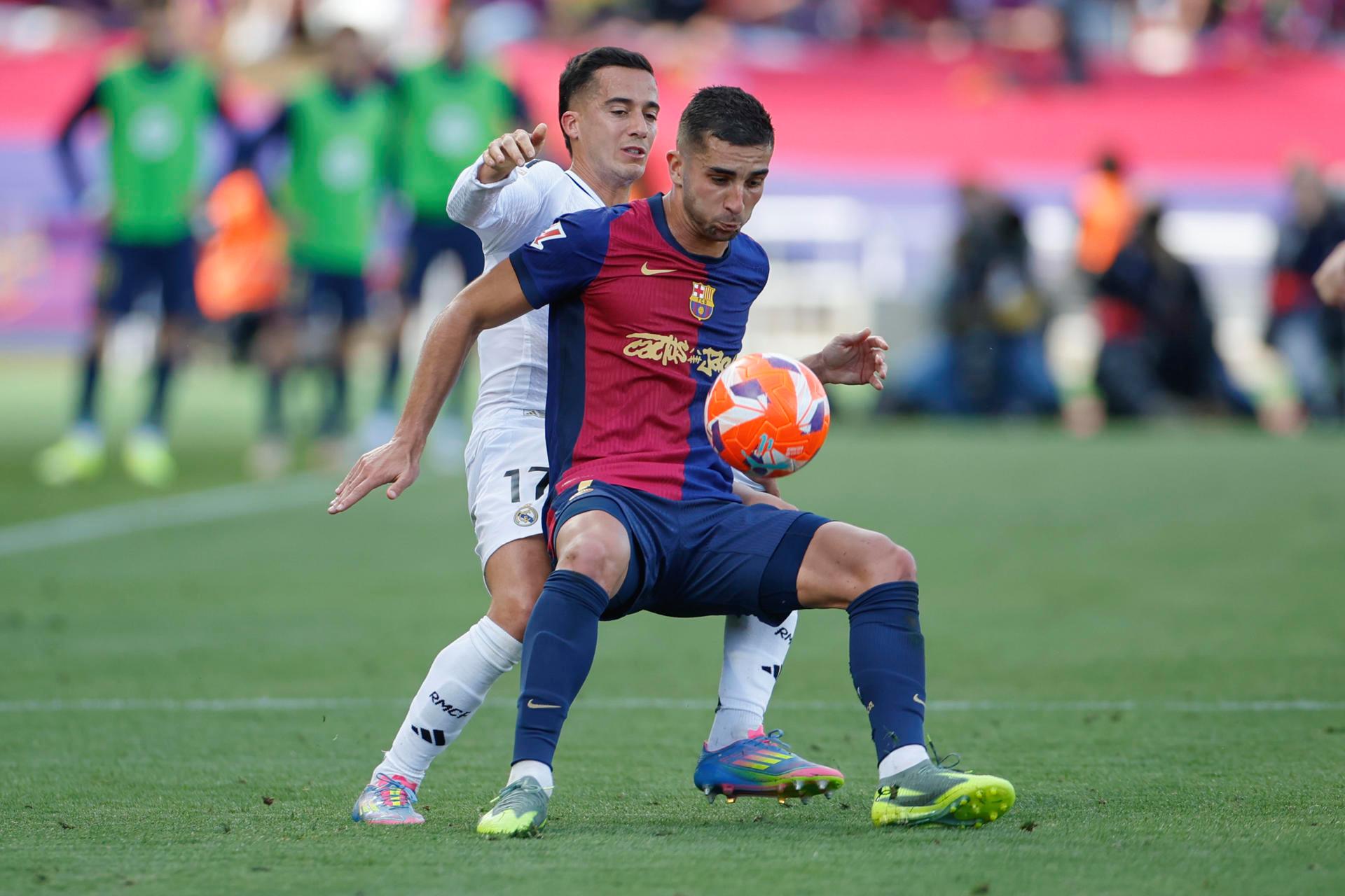 Lucas Vázquez y Ferran Torres - EFE
