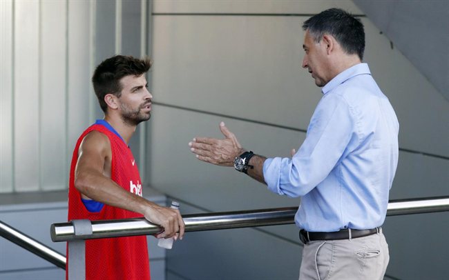 Bartomeu y Piqué, en un entreno